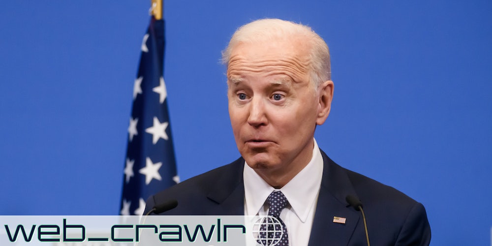 Joe Biden in front of a blue background. The Daily Dot newsletter web_crawlr logo is in the bottom left corner.